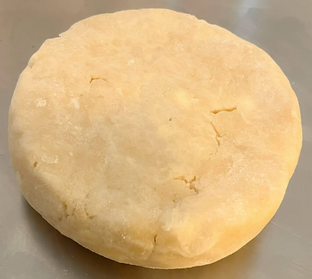 flattened disc of pie dough
