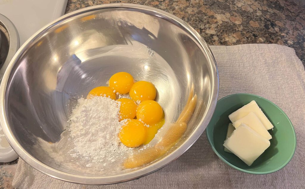 corn starch, egg yolks, and butter ready for tempering egg yolks
