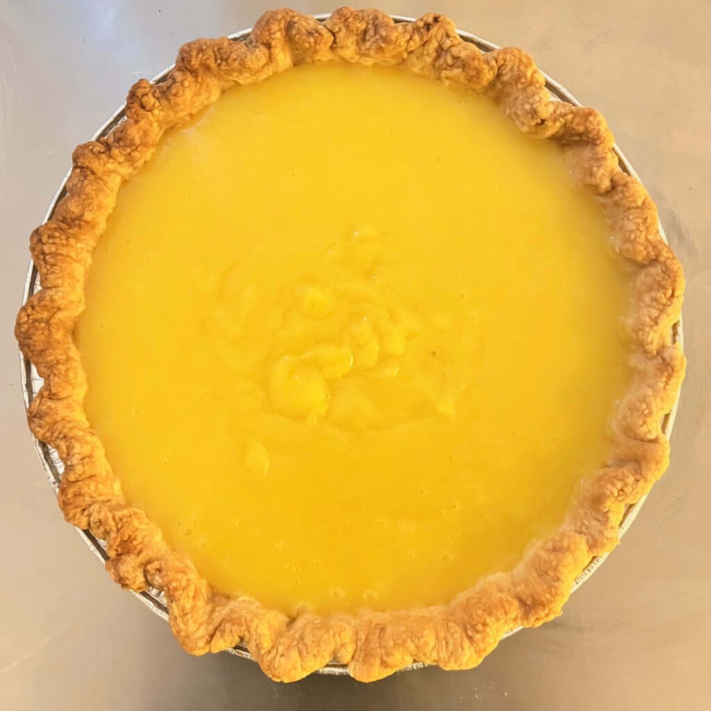 an untopped lemon meringue pie with no meringue