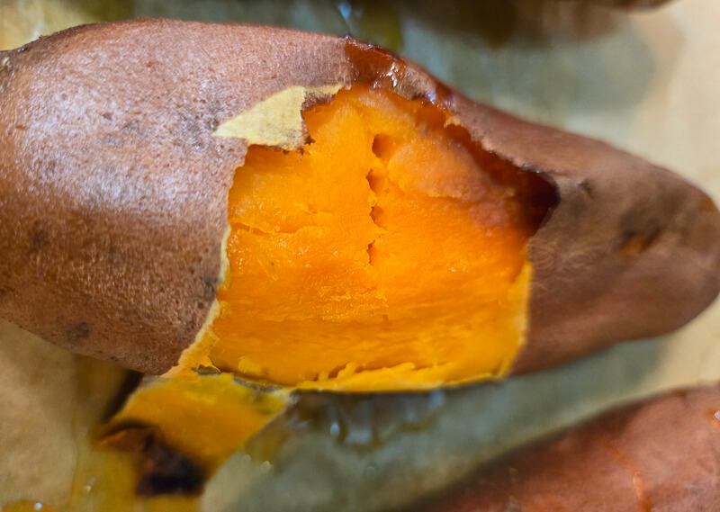 roasted sweet potato with skin easily peeling off