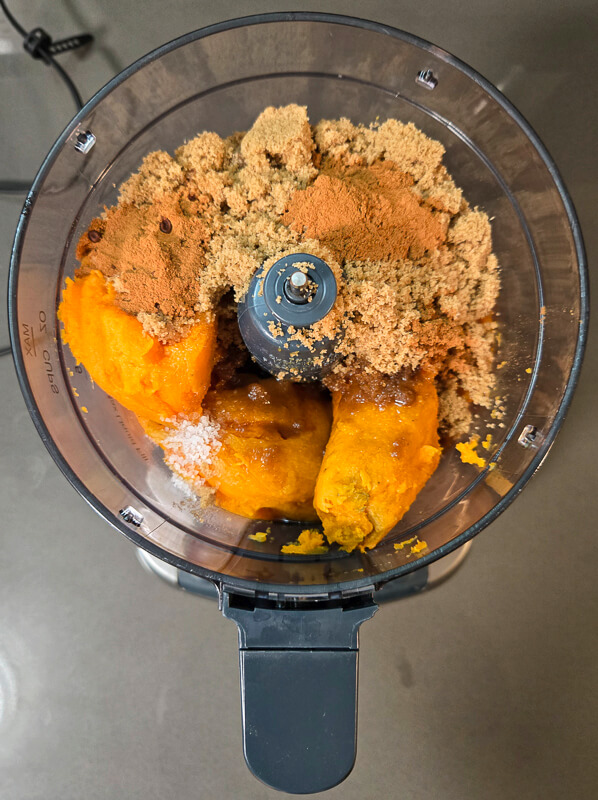 image of ingredients for brown butter sweet potato pie in a food processor