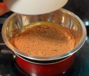 blooming cocoa powder in melted butter