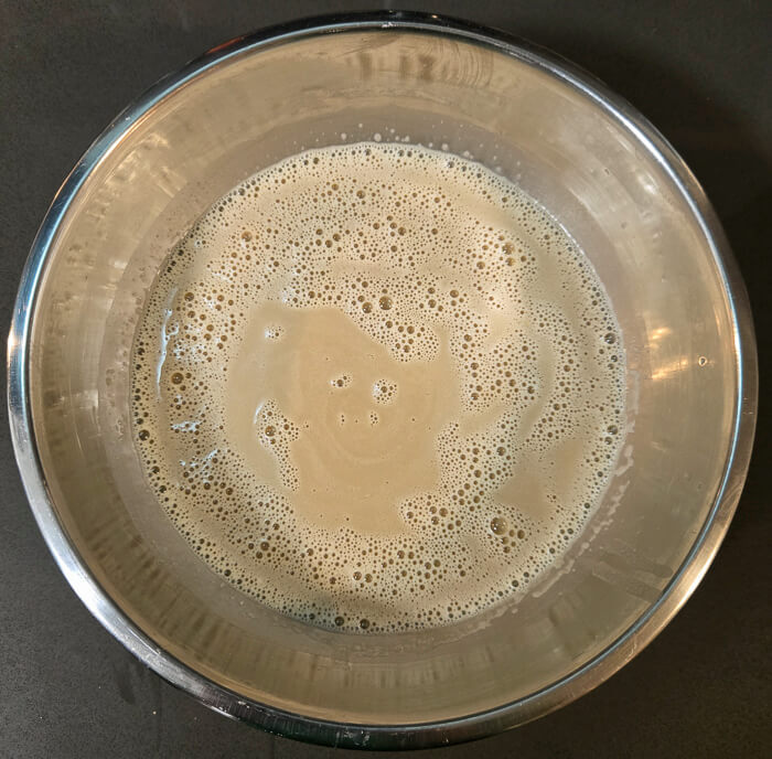 a photo of butterscotch custard after tempering the egg yolks