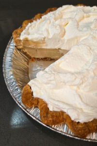close up shot with a cross section of butterscotch pie recipe