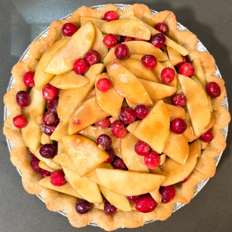 an untopped cranberry apple pie