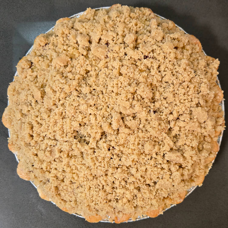 an unbaked crumble topped fruit pie