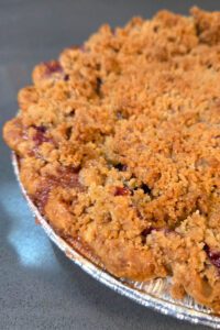close up photograph of a cranberry apple pie
