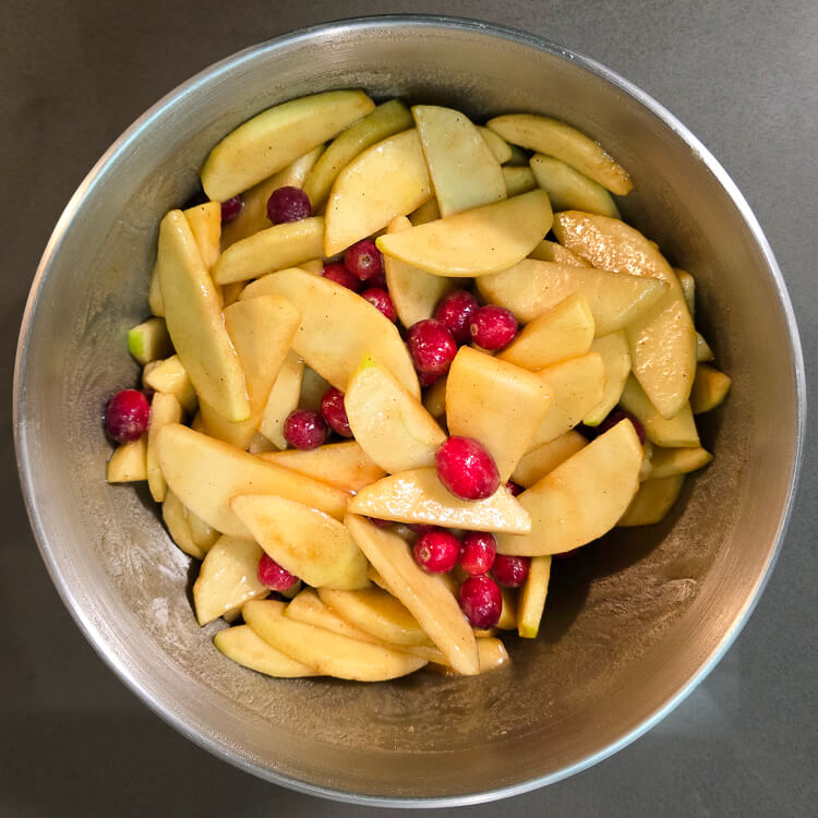 filling for cranberry apple pie mixed in a bowl