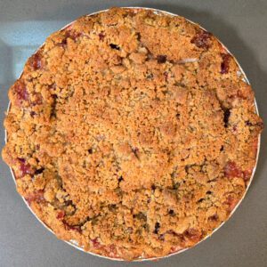 an overhead photograph of a baked cranberry apple pie