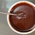 an overhead shot of a smooth dark chocolate ganache