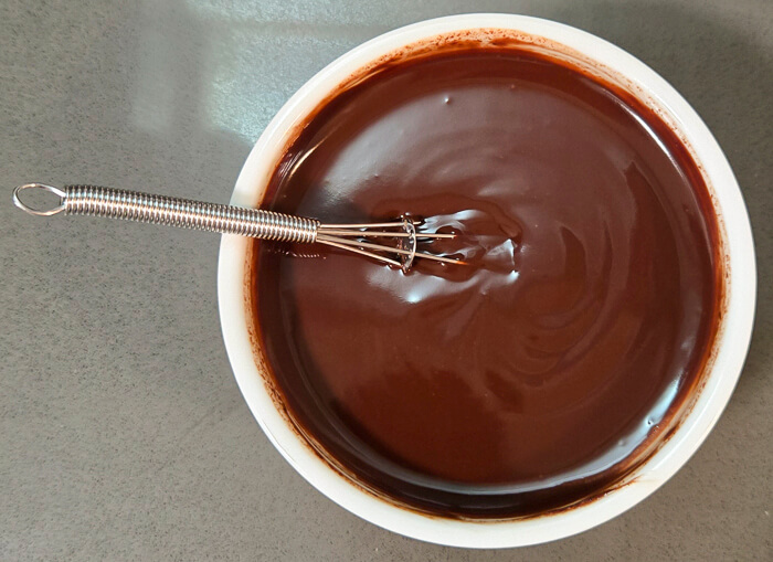 an overhead shot of a smooth dark chocolate ganache