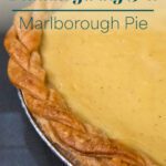 Golden Marlborough pie with braided crust and smooth custard filling, a forgotten apple custard pie once served for Thanksgiving in 19th-century New England.