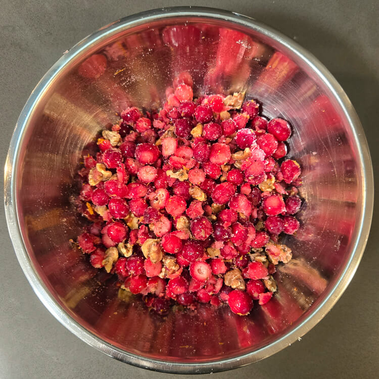 cranberries, walnuts, and sugar mixed together