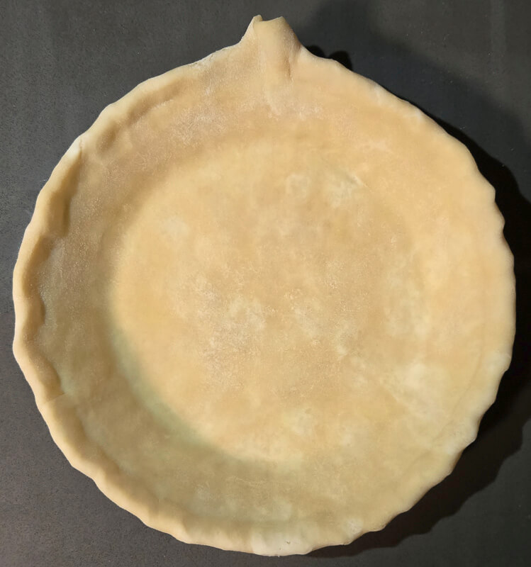 how to finish rolling the edge of a pie crust for crimping