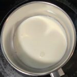 Photo of a pot with cream to be scalded