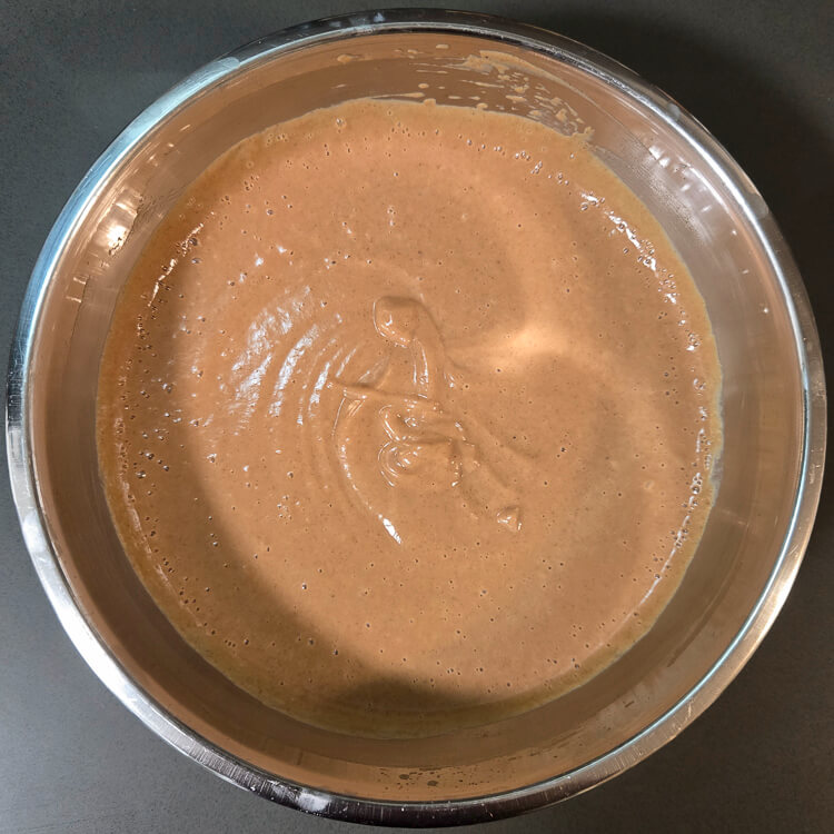 apple butter pie filling after being mixed in a mixing bowl