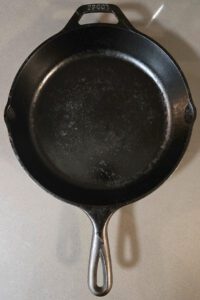 an overhead photo of a well-seasoned cast iron pan