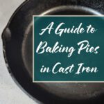 Close-up of a cast iron skillet with text reading “A Guide to Baking Pies in Cast Iron” from Doggone Baking, a post about how to bake pies in cast iron pans.