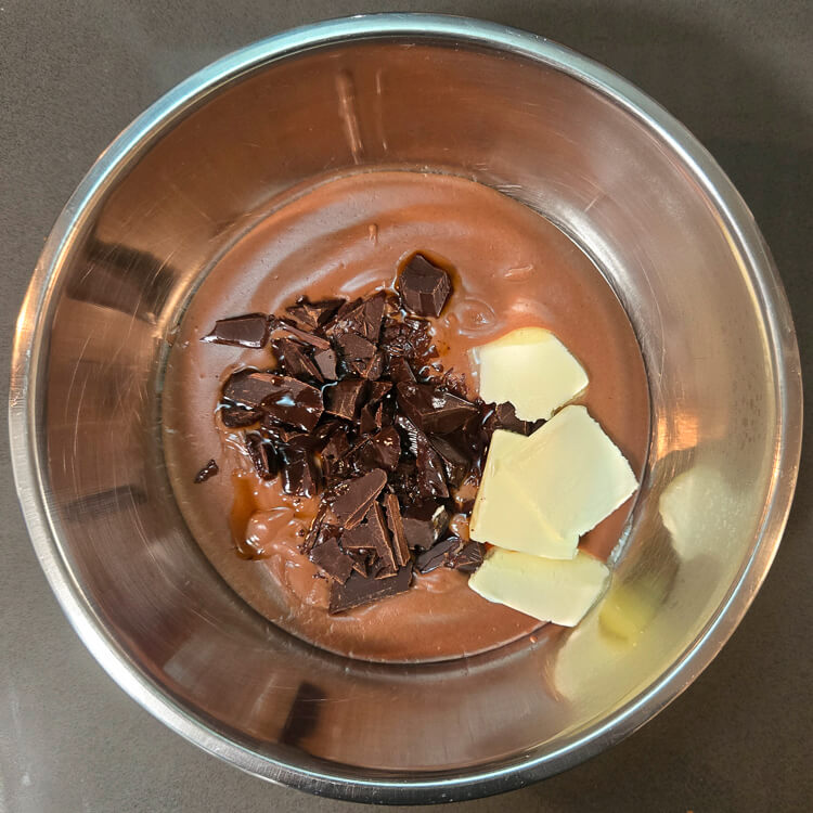hot chocolate pudding with chocolate chips and butter added to make it richer