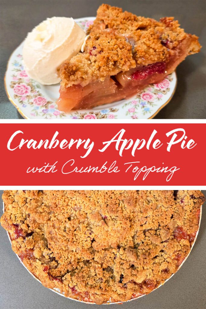 Slice of cranberry apple pie with crumble topping served with a scoop of vanilla ice cream on a floral plate.