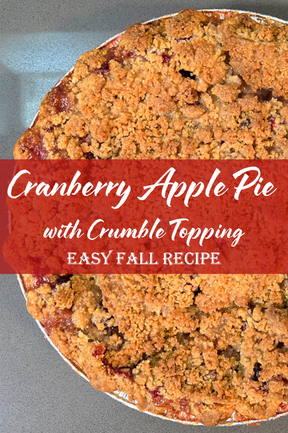 Overhead view of cranberry apple pie with golden crumble topping and red text overlay reading “Cranberry Apple Pie with Crumble Topping – Easy Fall Recipe.”
