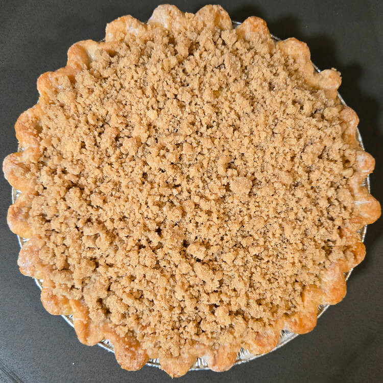 overhead photo of an unbaked Dutch apple pie before it goes in the oven