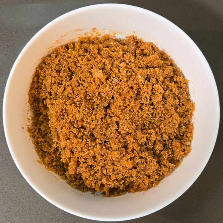 mixed graham cracker crust before being pressed into a pie tin