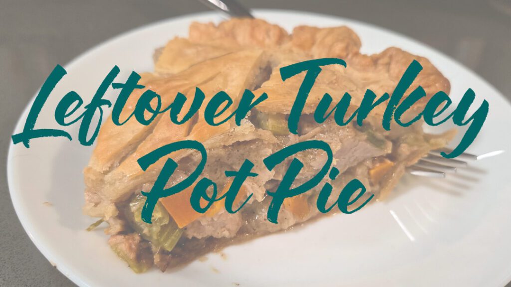 close up photo of a slice of turkey pot pie made with thanksgiving leftovers with text overlay that reads "leftover turkey pot pie"