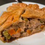 close up photo of a slice of turkey pot pie made with leftover thanksgiving turkey and green bean casserole