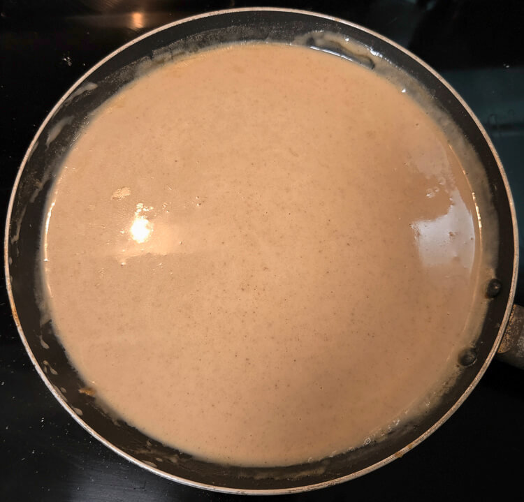 turkey gravy being made on a stovetop