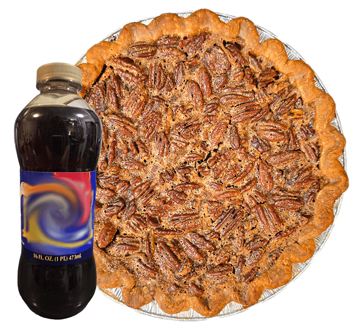 overhead photo of pecan pie with a bottle of dark corn syrup