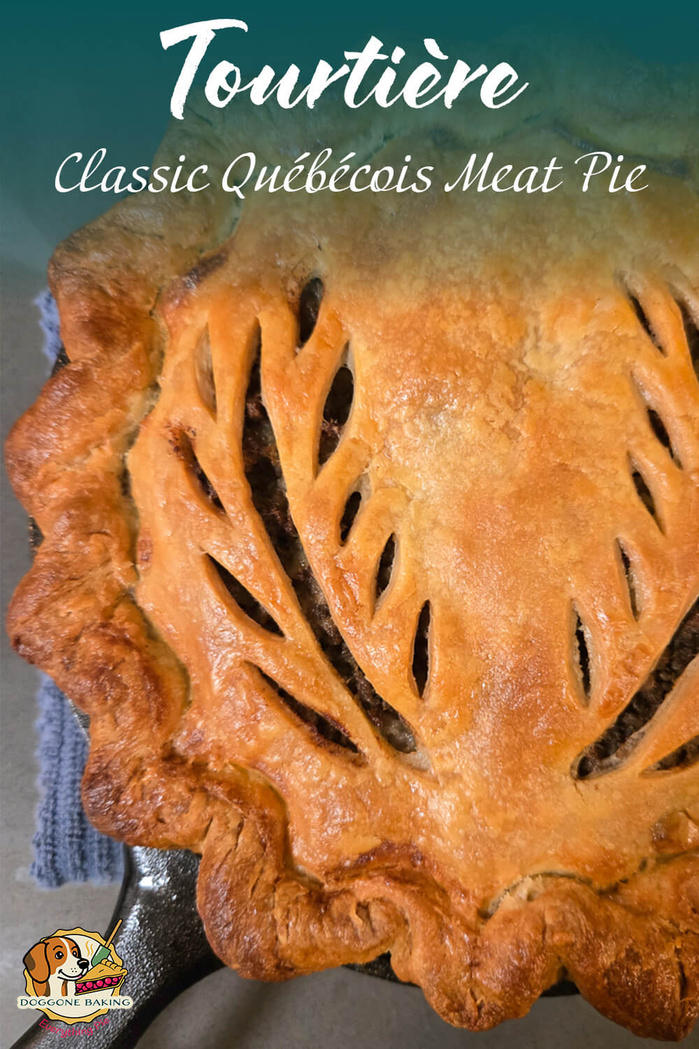 Close-up of a golden Québécois tourtière with hand-cut leaf vents and crimped edges, baked in a cast iron skillet.
