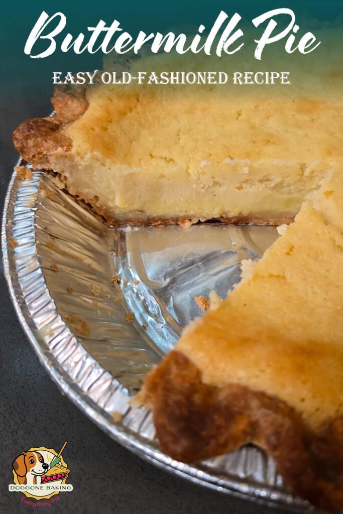 Slice of homemade buttermilk pie in a metal pie tin with a creamy custard filling and golden brown crust.