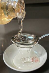a photo of corn syrup being drizzled onto a spoon