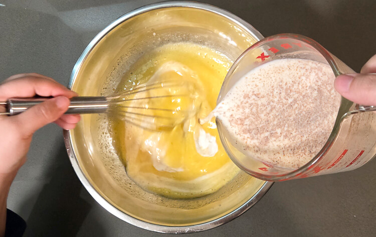 overhead photo of tempering eggs for pastry cream