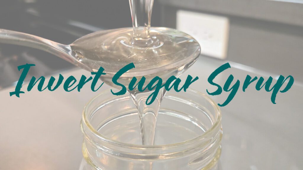 invert sugar syrup being poured onto a spoon with text overlay that reads "Invert Sugar Syrup"