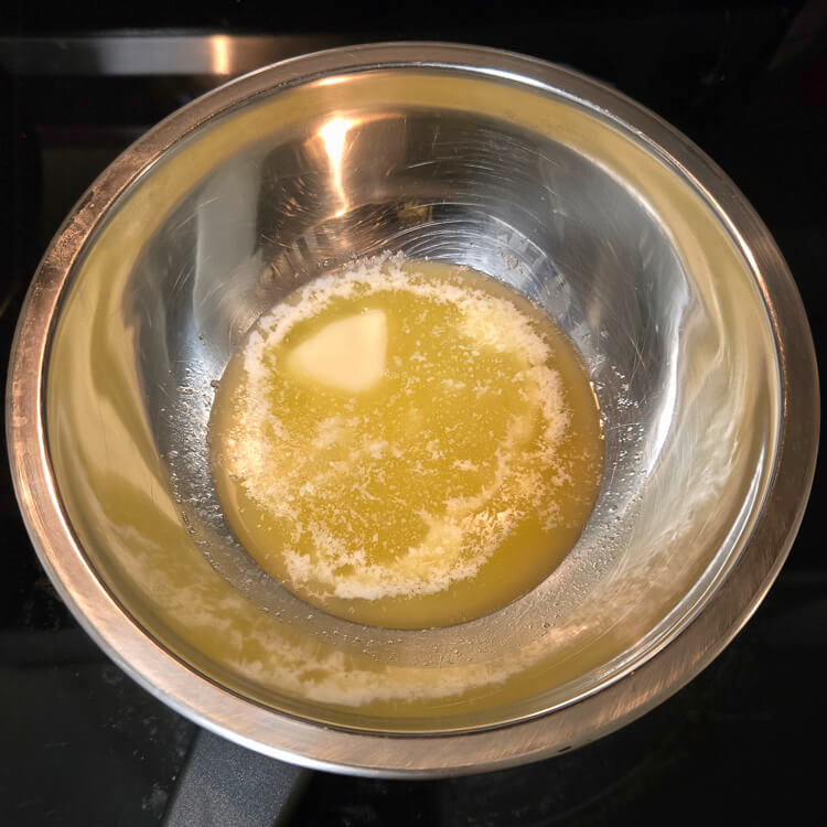 melted butter on a double boiler on a stovetop