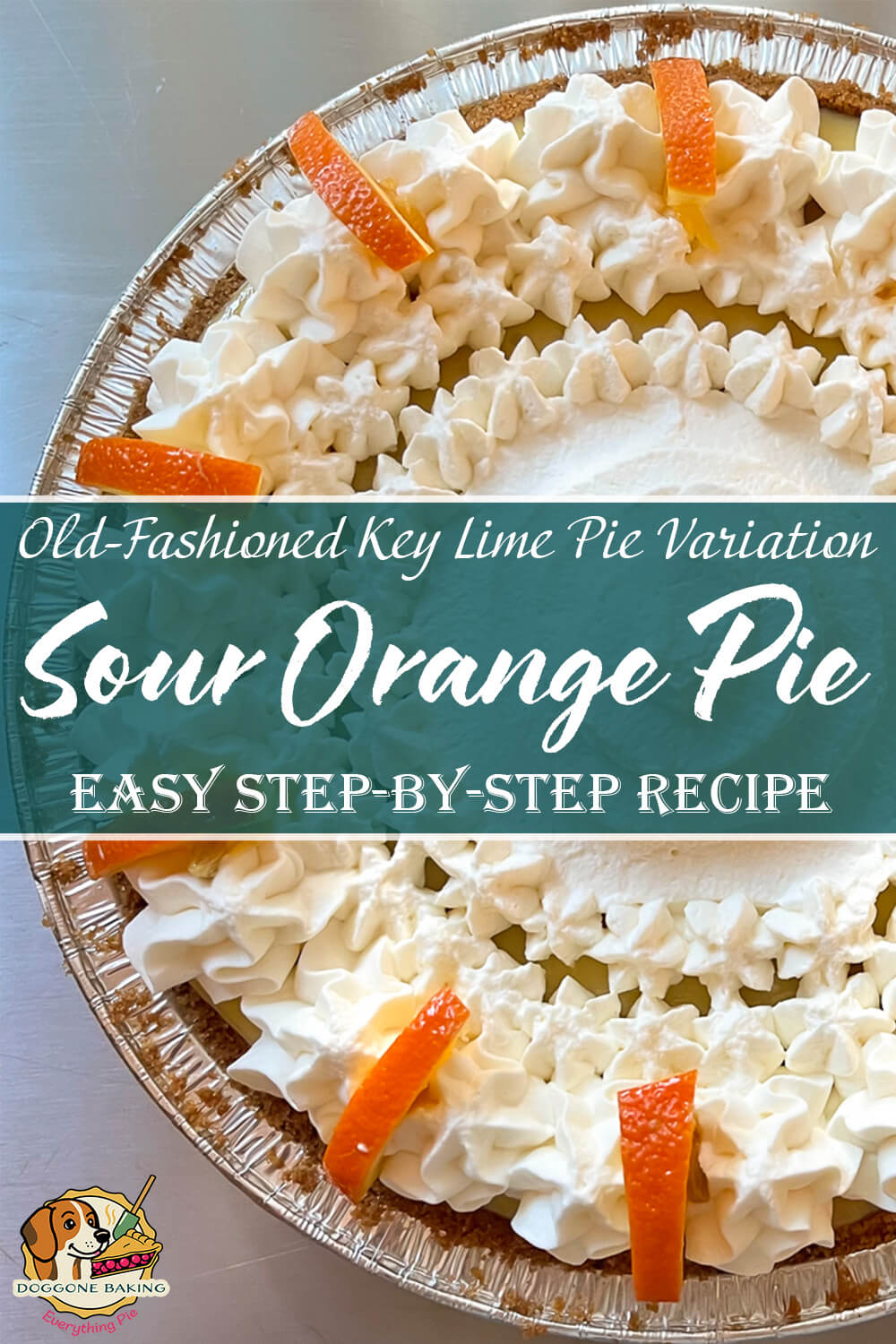 Sour orange pie topped with whipped cream and garnished with sour orange peel in a graham cracker crust, a traditional Florida citrus custard pie similar to key lime pie.