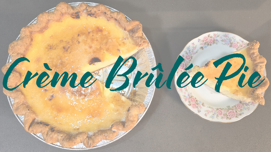 a whole crème brûlée pie with a slice cut out and placed on an antique floral plate next to it with text overlay that reads "Creme Brulee Pie"