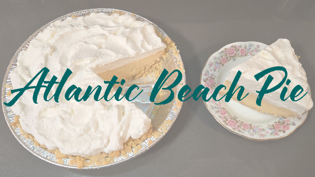 Atlantic Beach Pie Recipe Header image showing a whole atlantic beach pie with a slice cut out and placed on a plate next to it. Text overlay reads "Atlantic Beach Pie Recipe"