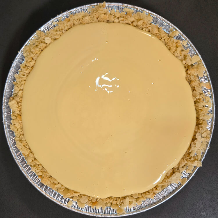 an overhead photo of an atlantic beach pie before the custard filling is baked