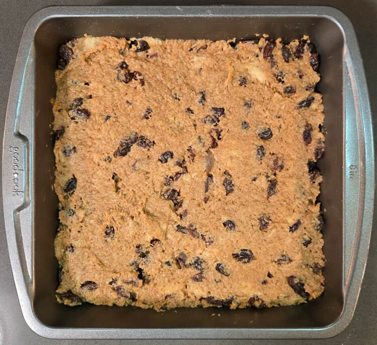 overhead photo of a chester cake in progress showing gur cake filling layer