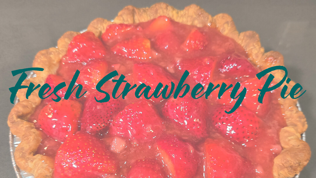 Fresh strawberry pie with homemade glaze closeup photo with text overlay that reads "Fresh Strawberry Pie" for Fresh strawberry pie recipe