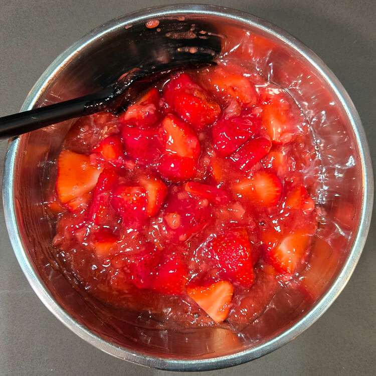 filling for fresh strawberry pie before being turned out into a blind baked pie crust