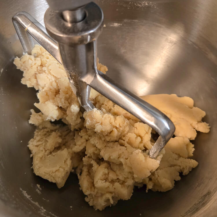 pasta frolla (Italian shortcrust pastry) in the bowl of a kitchenaid stand mixer