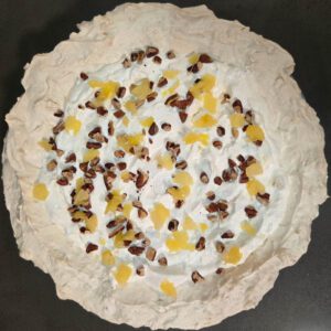 overhead view of company's coming pie, an Arkansas recipe in a meringue pie crust with pineapple whipped cream