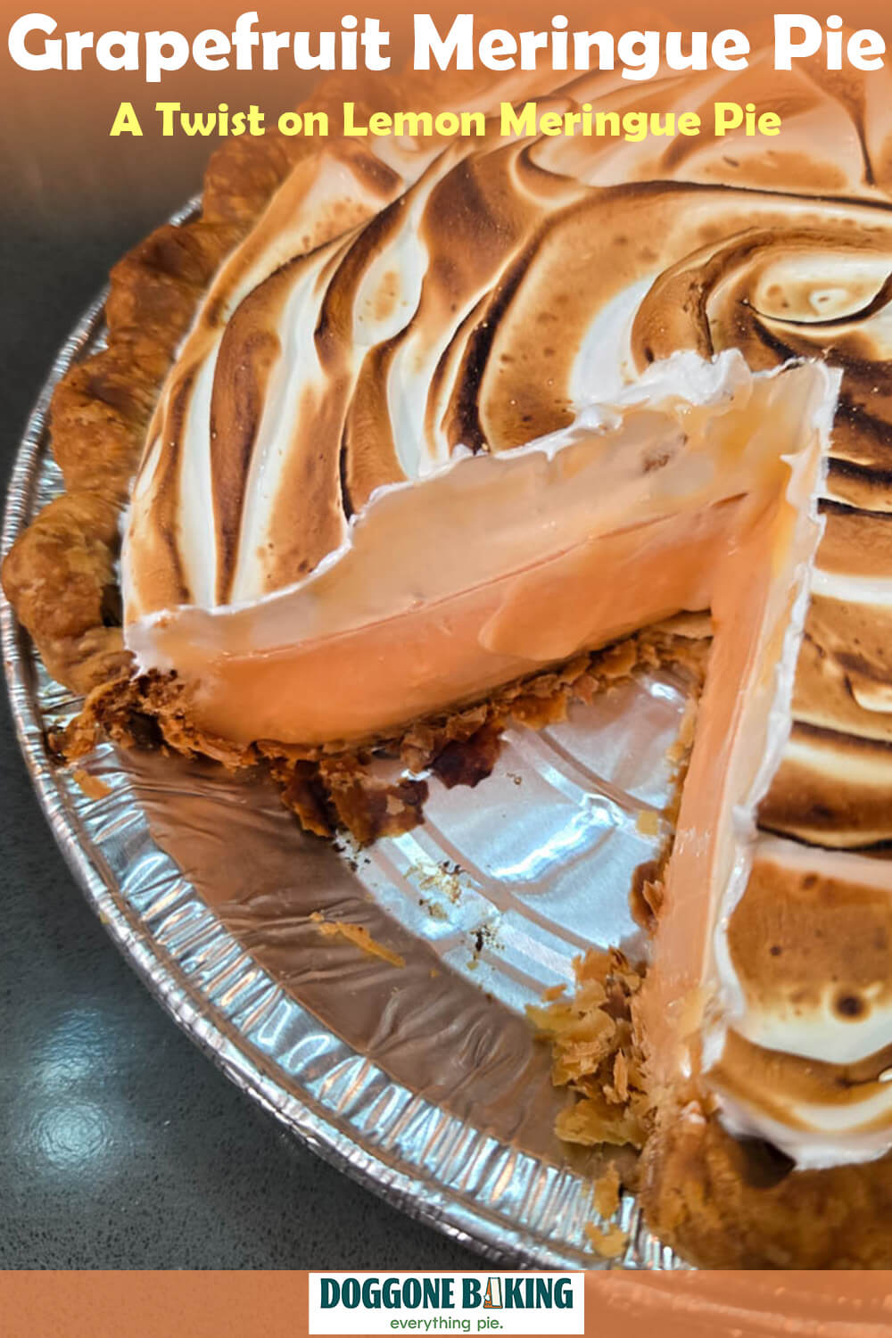 A Pinterest pin for a grapefruit meringue pie recipe. The image shows a close-up angled view of a grapefruit meringue pie with a slice removed, revealing a pale pink grapefruit curd filling topped with a tall elaborately swirled toasted meringue, with the Doggone Baking logo at the bottom. Text overlay reads "Grapefruit Meringue Pie | A Twist on Lemon Meringue Pie."