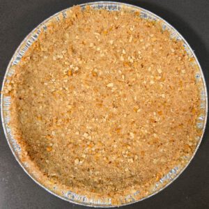 overhead photo of a pretzel pie crust made with crushed pretzels