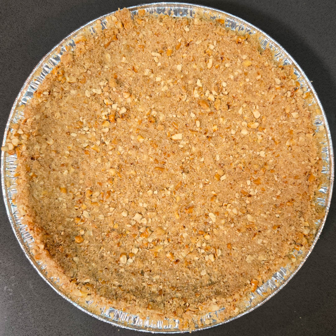 overhead photo of a pretzel pie crust made with crushed pretzels