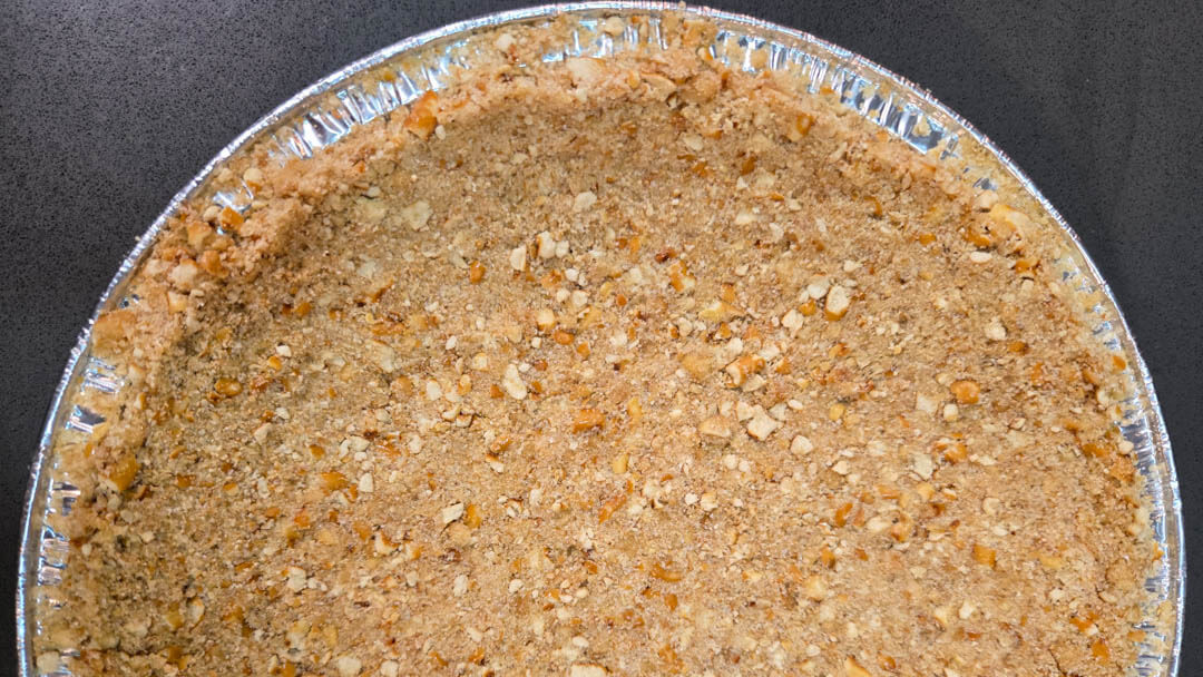 overhead landscape photo of a pretzel crust for pie